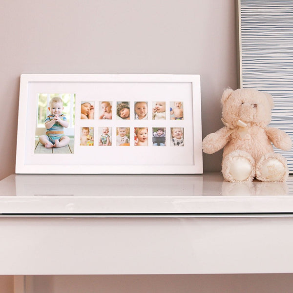 Pearhead okvir za slike bebine prve godine - 1 velika i 12 malih - Sold out